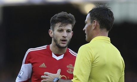 Adam Lallana, left, speaks with Mark Clattenburg during Southampton 2-1 defeat at Everton